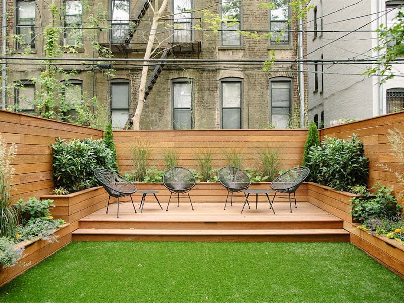Remodeled NYC terrace with new plantings and seating