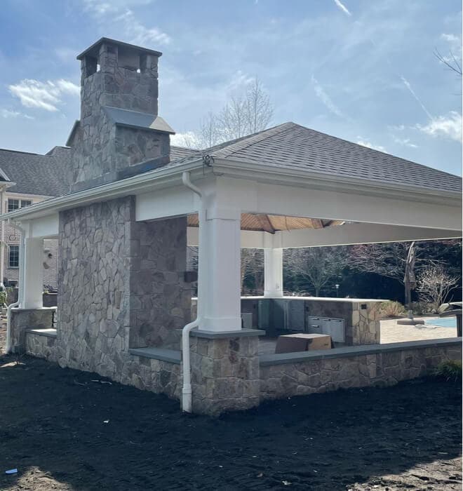 Outdoor pavilion kitchen and dining area