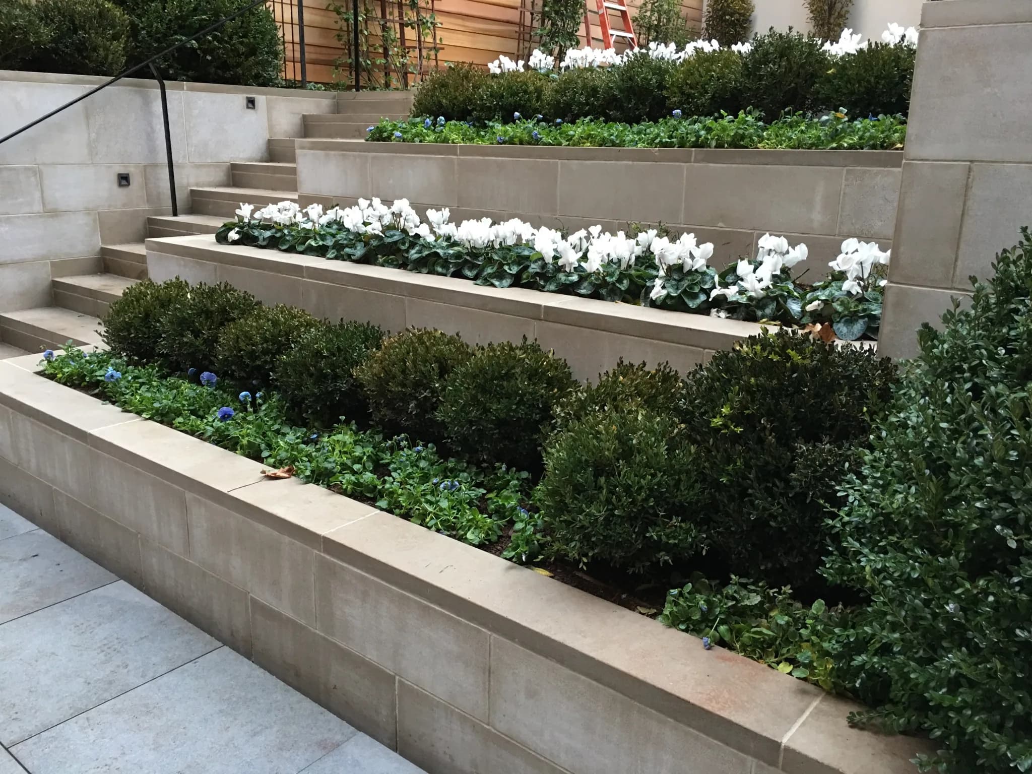 Custom planters built into an outdoor terrace