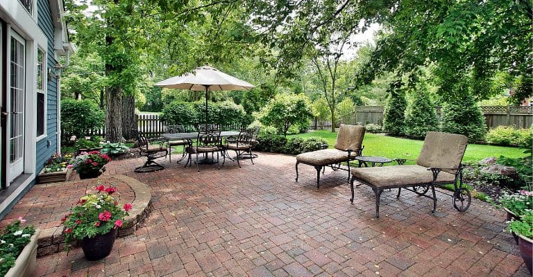 Brick patio laid in a herringbone pattern
