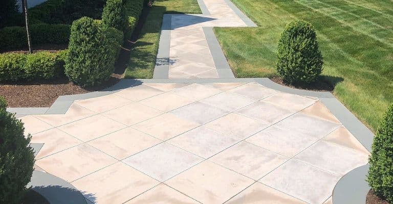 Limestone walkway with a bluestone border